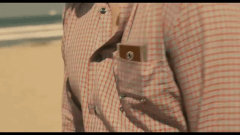 Wearable, super intelligent AI earpiece in the movie “Her”